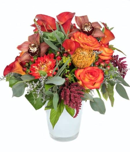A fall mixture including calla lilies, dahlias, roses, amaranthus and more. Rustic and bright! 